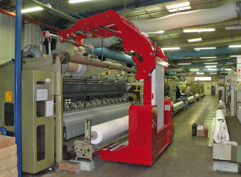 Insertion of sectional warp beams in warp-knitting machines